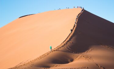 4x4 vehicle driving through the Moroccan desert on a tour from Marrakech to the Sahara