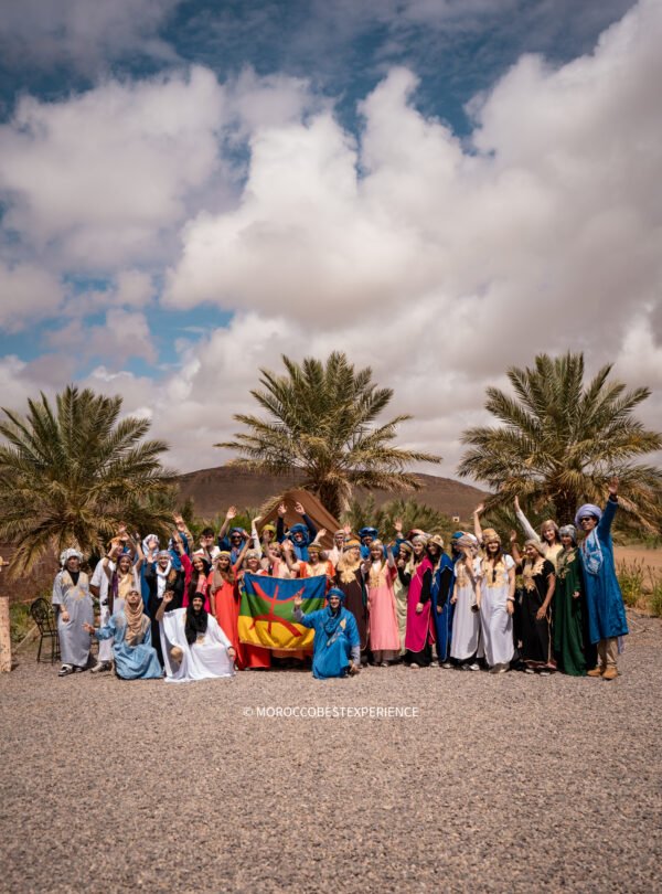 students trying moroccan traditional clothes
