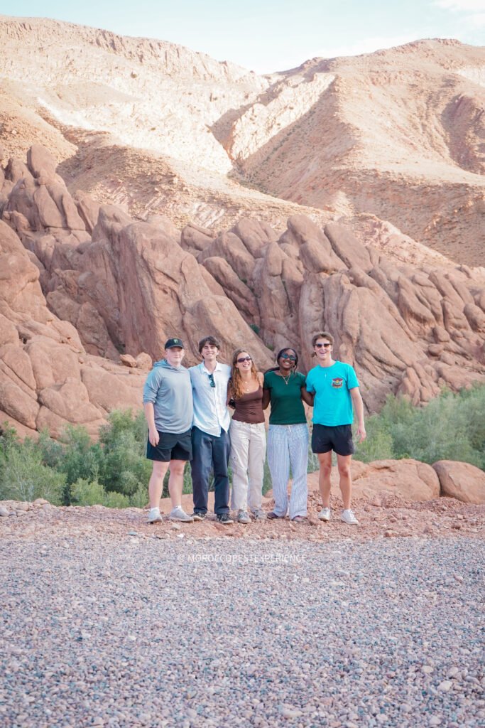 students exploring the rock formations in morocco